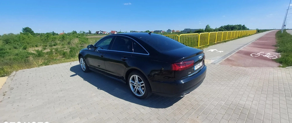 Audi A6 cena 59900 przebieg: 240093, rok produkcji 2015 z Ełk małe 379